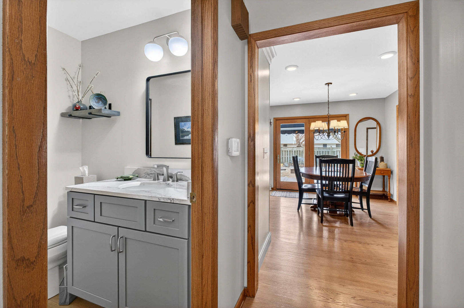 3615 74th Street Moline, IL 61265 - Photo 9 of 44 a view of a dining room with furniture and wooden floor