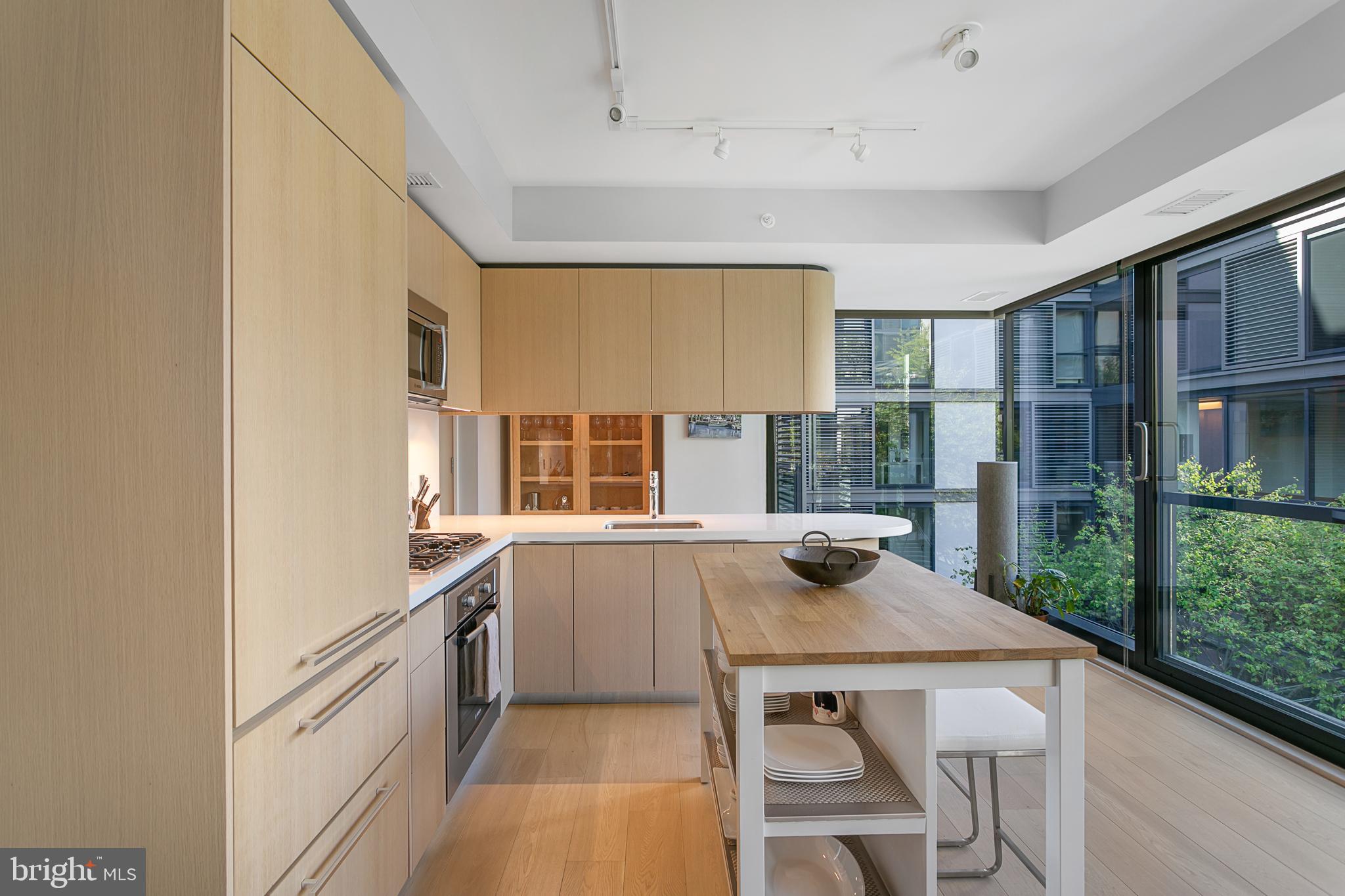 925 H Street Northwest, Unit 516 Washington, DC 20001 - Photo 10 of 37 Kitchen With Island