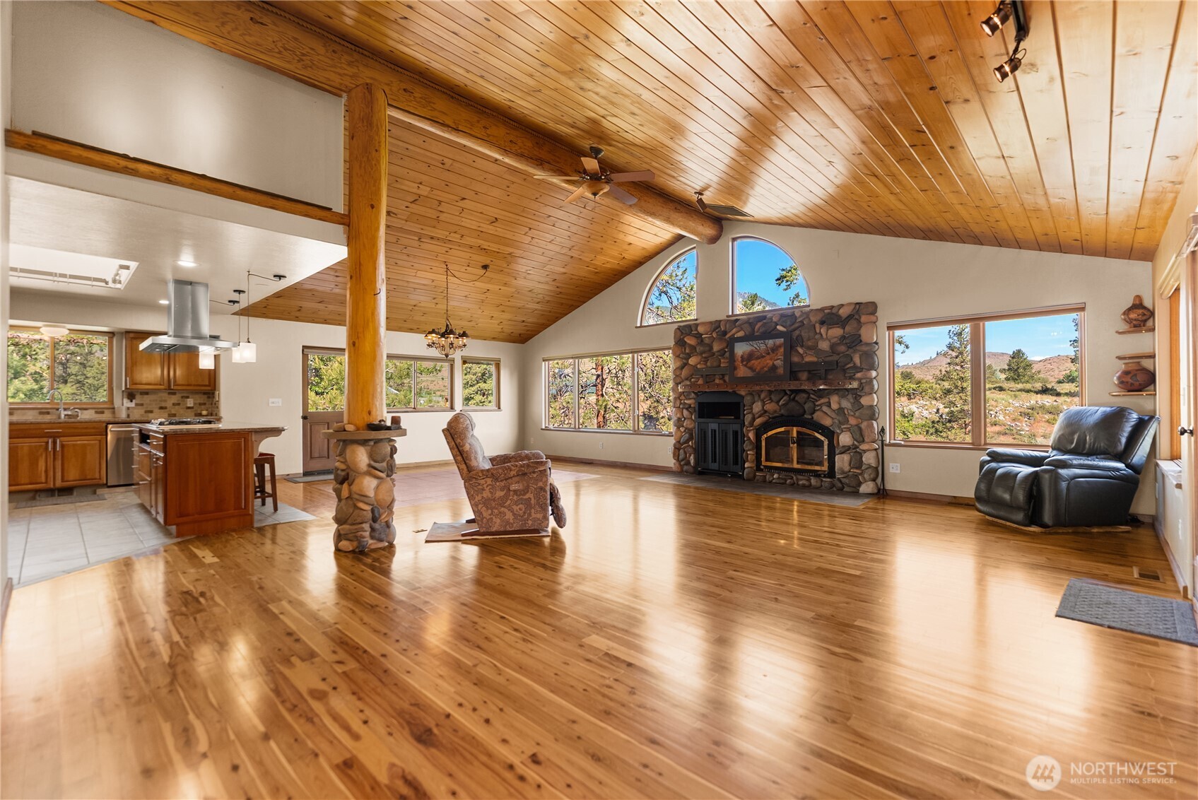 2621 Highway 153 Twisp, WA 98856 - Photo 4 of 40 a living room with furniture and a fireplace