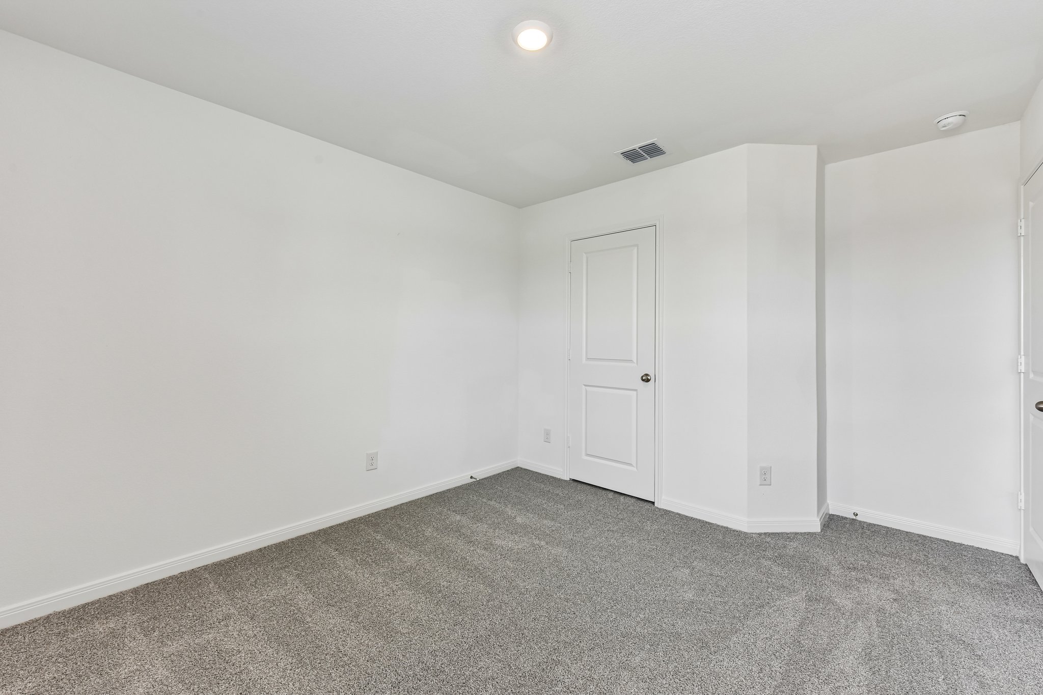 346 Low Pasture Trail Maxwell, TX 78656 - Photo 15 of 29 Carpeted interior space featuring white painted walls and trim