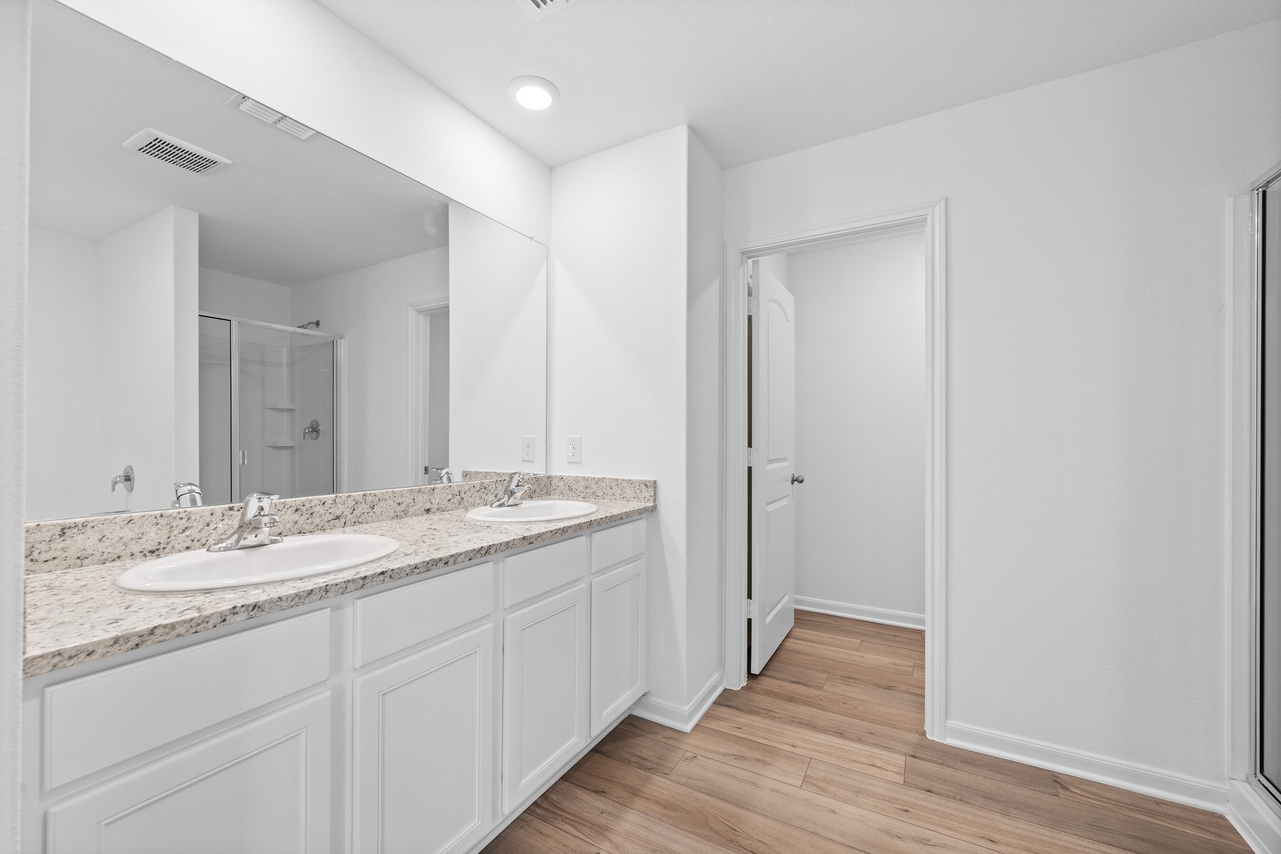 346 Low Pasture Trail Maxwell, TX 78656 - Photo 4 of 9 a bathroom with a granite countertop sink mirror and