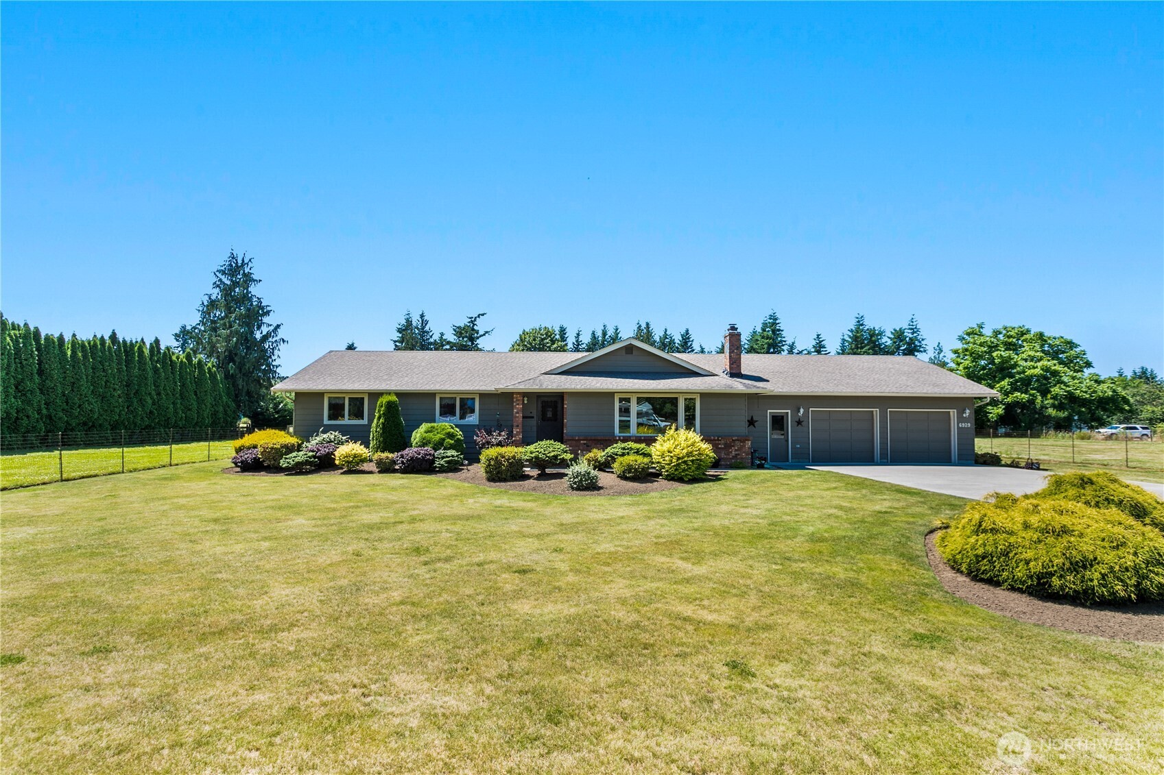 6929 Mission Road Everson, WA 98247 - Photo 2 of 36 a view of a house with backyard and sitting area