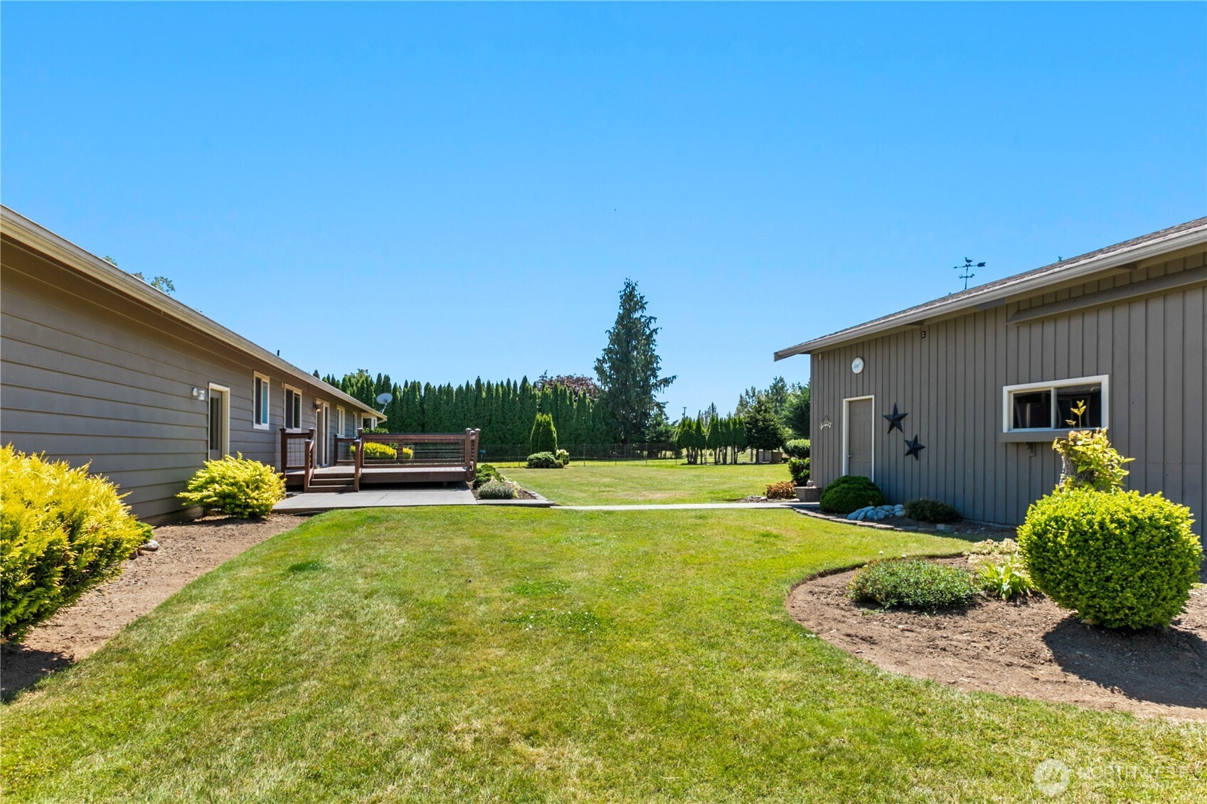 6929 Mission Road Everson, WA 98247 - Photo 21 of 36 a house view with a garden space