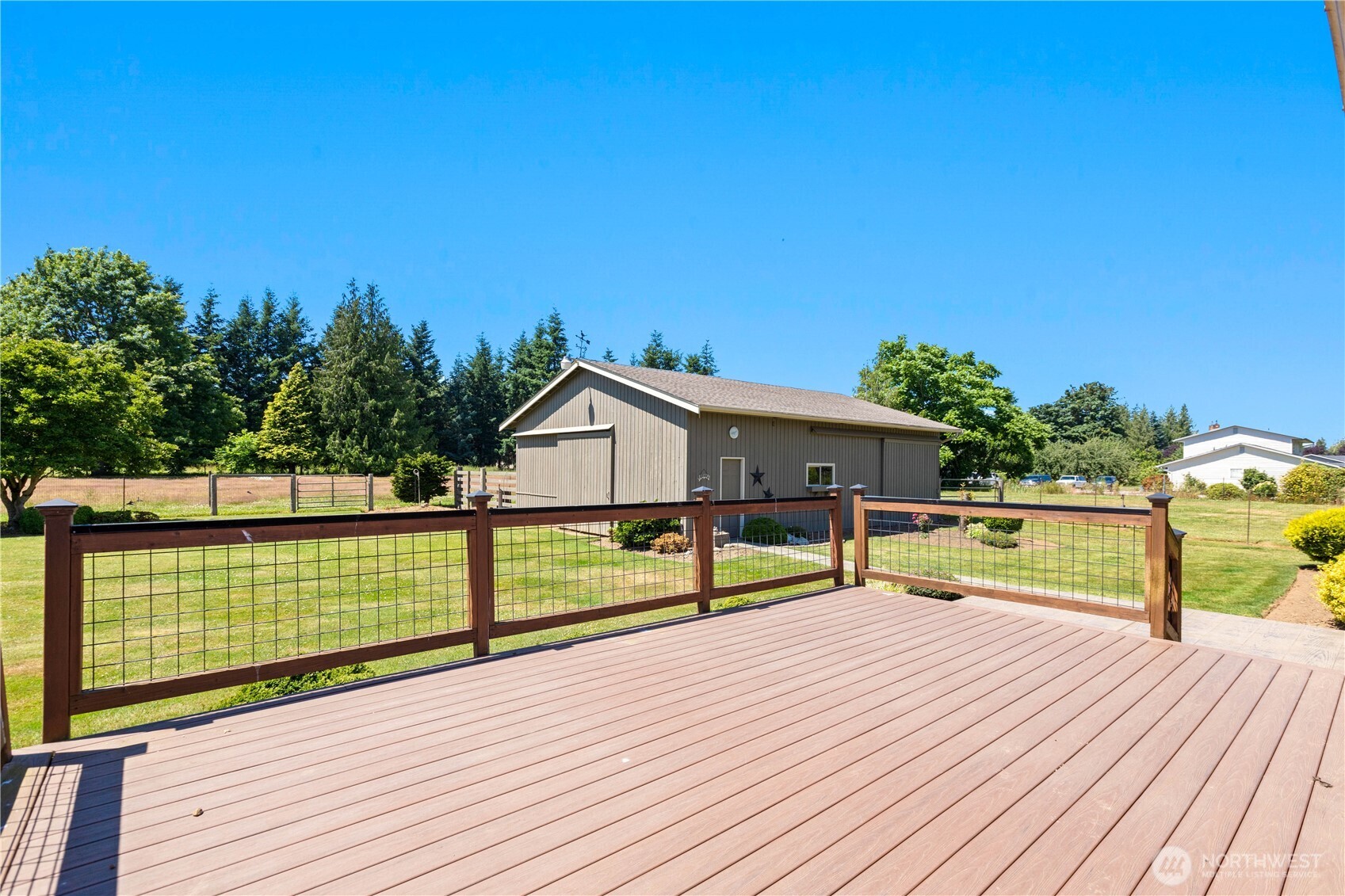 6929 Mission Road Everson, WA 98247 - Photo 28 of 36 a view of a deck with chairs and wooden floor