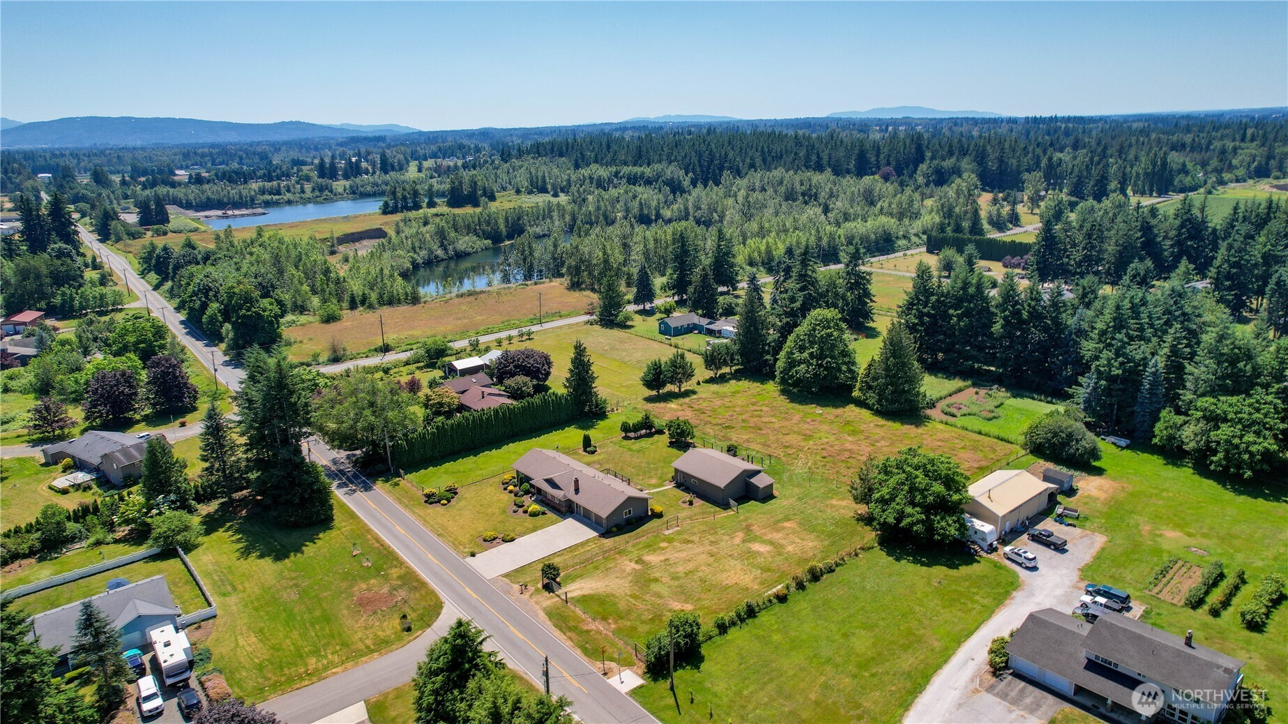 6929 Mission Road Everson, WA 98247 - Photo 34 of 36 an aerial view of a house with yard swimming pool and outdoor seating