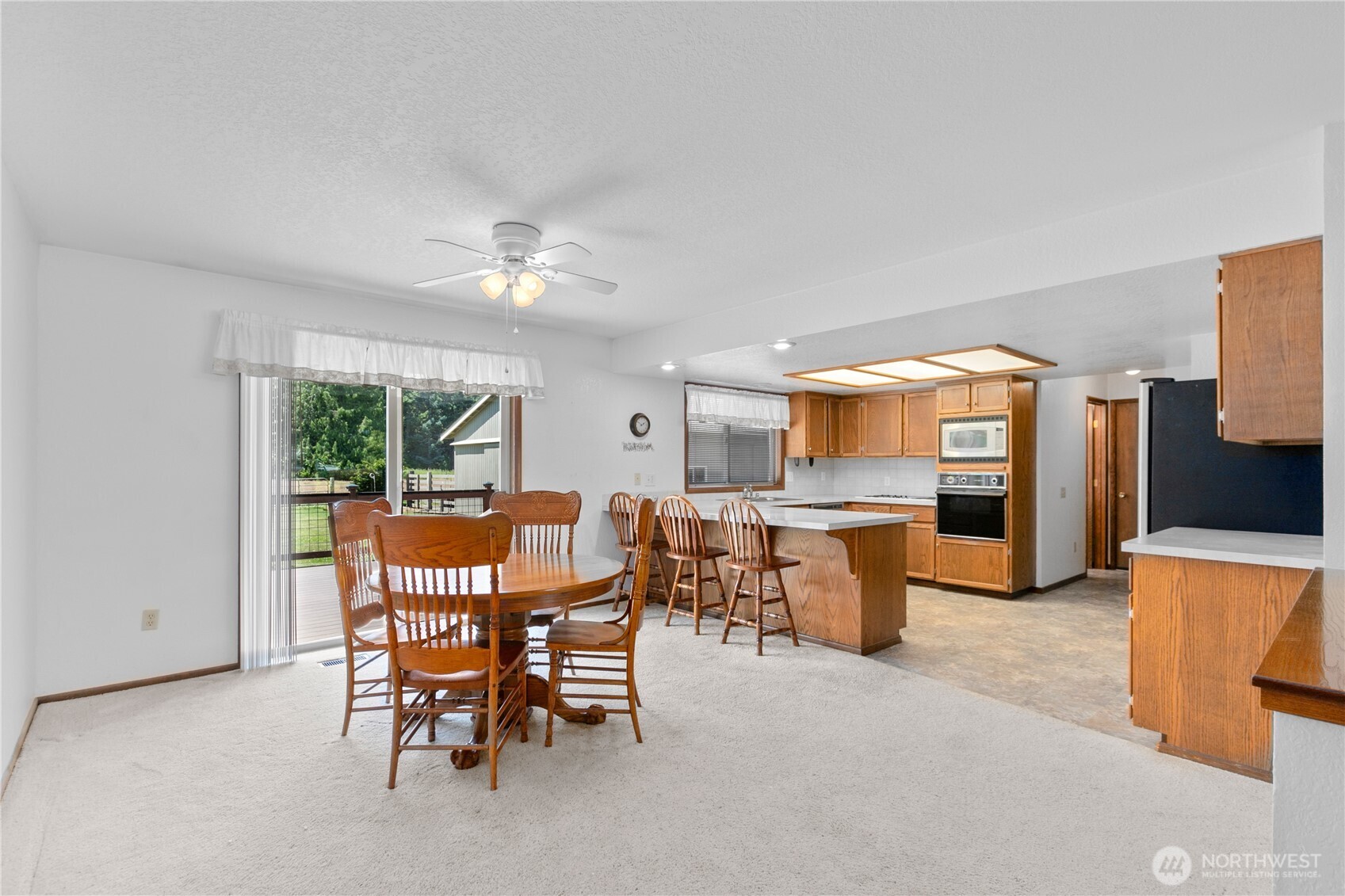 6929 Mission Road Everson, WA 98247 - Photo 9 of 36 a dining room with furniture and window