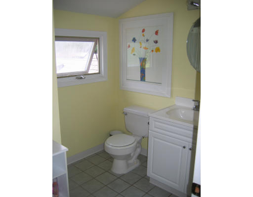 52 Gates Pond Road Berlin, MA 01503 - Photo 7 of 9 a bathroom with a toilet and a sink