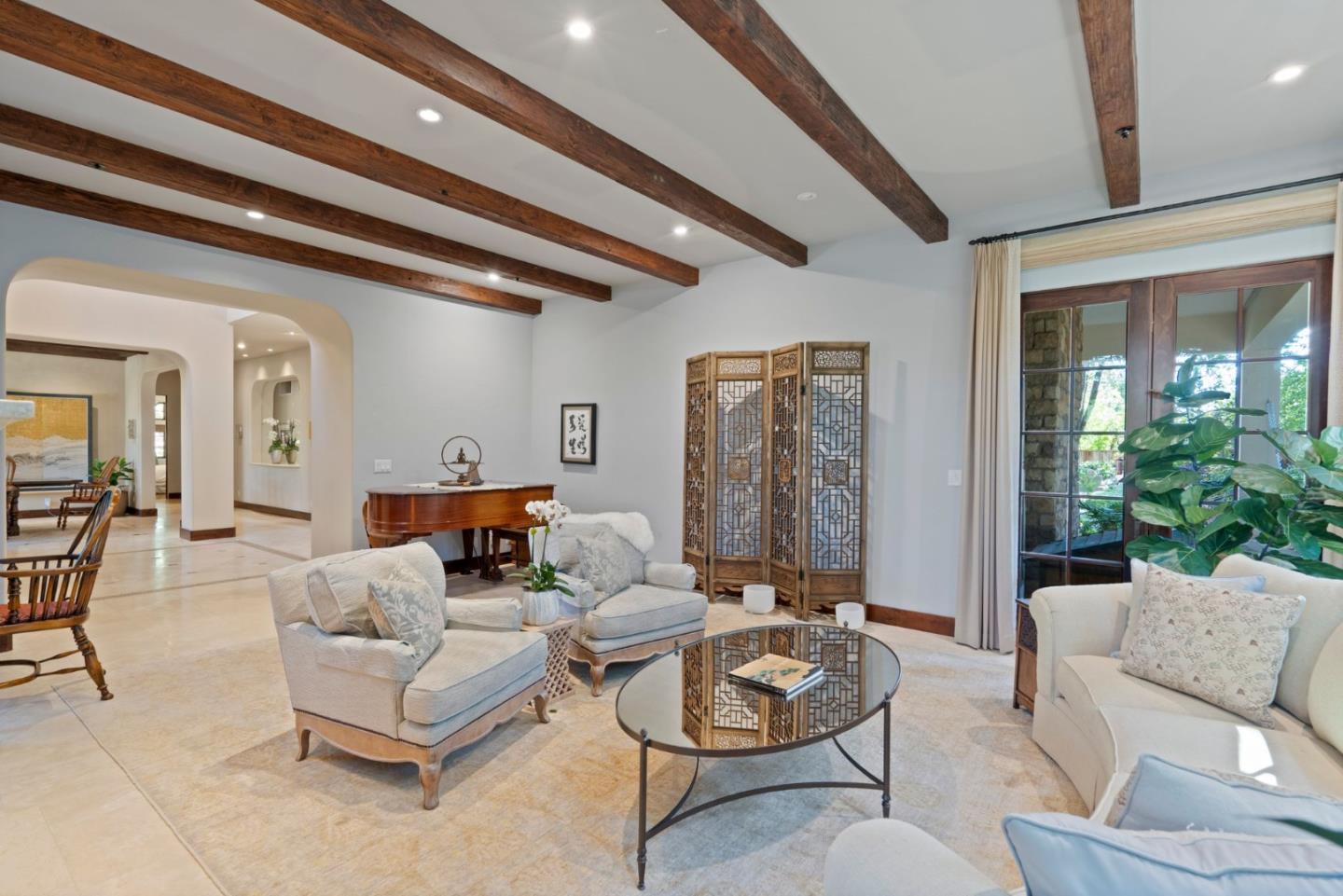 70 Joyce Road Hillsborough, CA 94010 - Photo 13 of 100 a living room with furniture and a potted plant