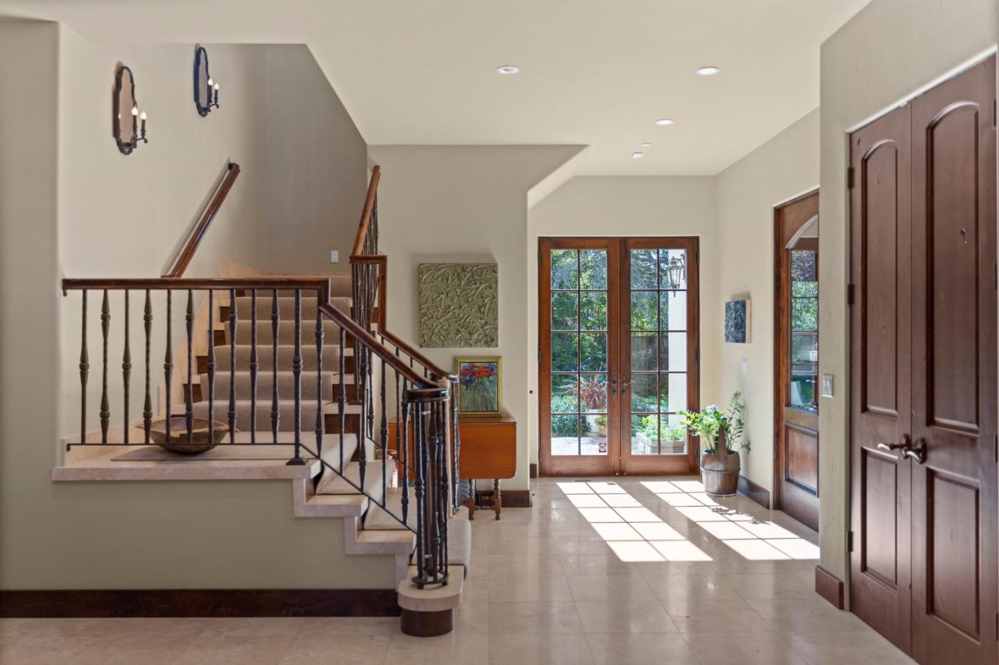 70 Joyce Road Hillsborough, CA 94010 - Photo 18 of 100 a view of an entryway with wooden floor and windows