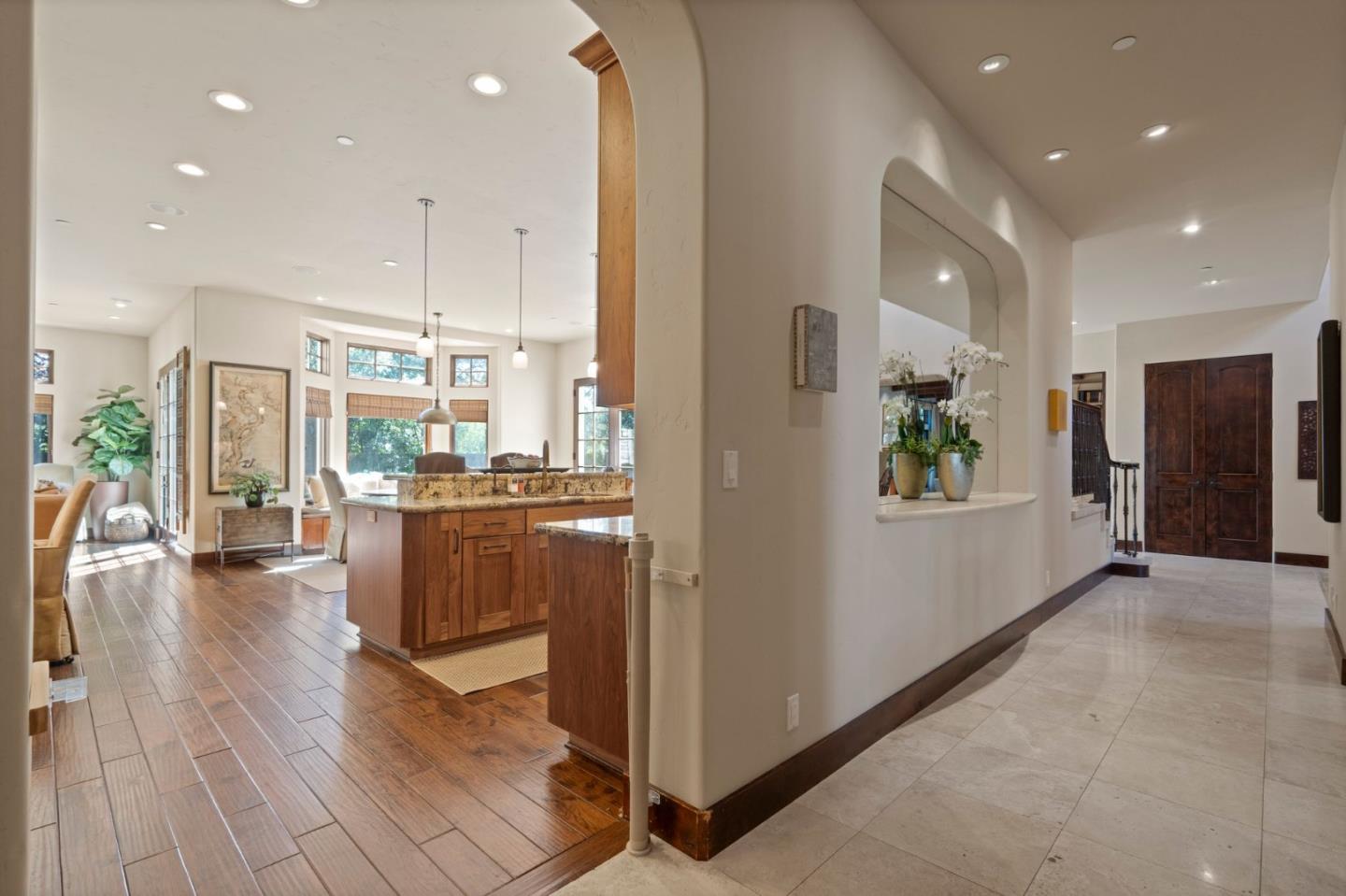 70 Joyce Road Hillsborough, CA 94010 - Photo 26 of 100 a view of a living room and kitchen with a large window