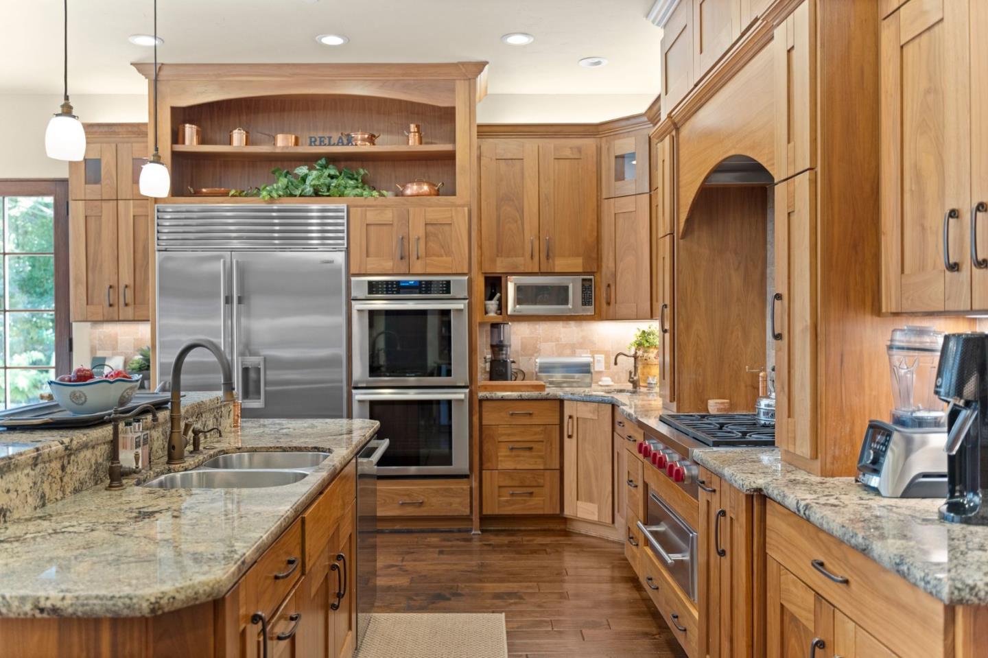 70 Joyce Road Hillsborough, CA 94010 - Photo 28 of 100 a kitchen with stainless steel appliances granite countertop a sink a stove and a refrigerator