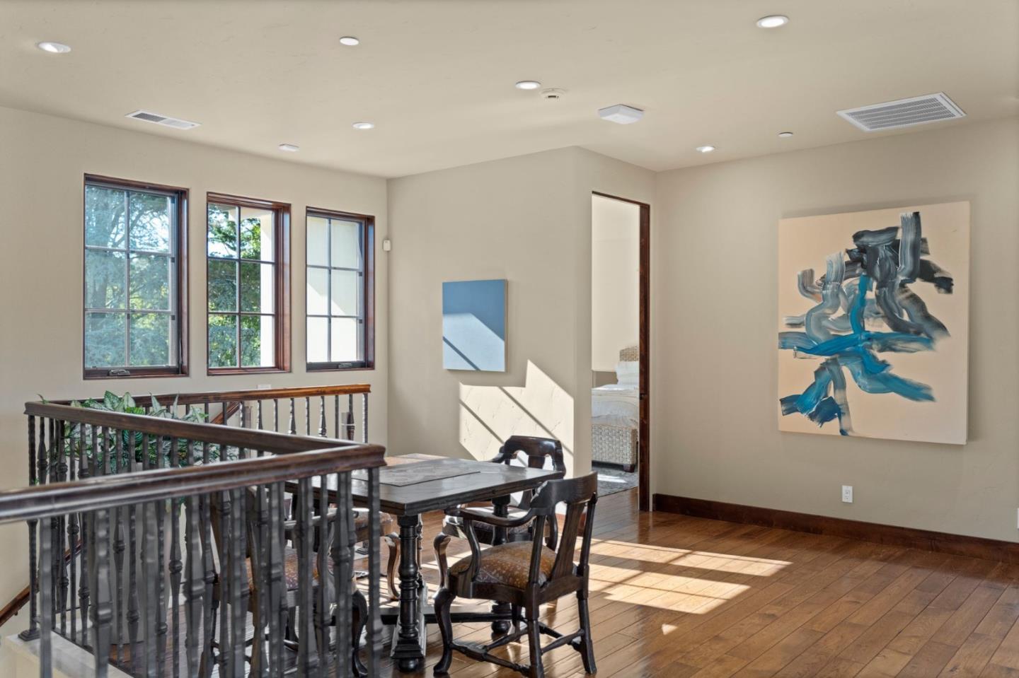 70 Joyce Road Hillsborough, CA 94010 - Photo 37 of 100 a view of a hallway with wooden floor and stairs