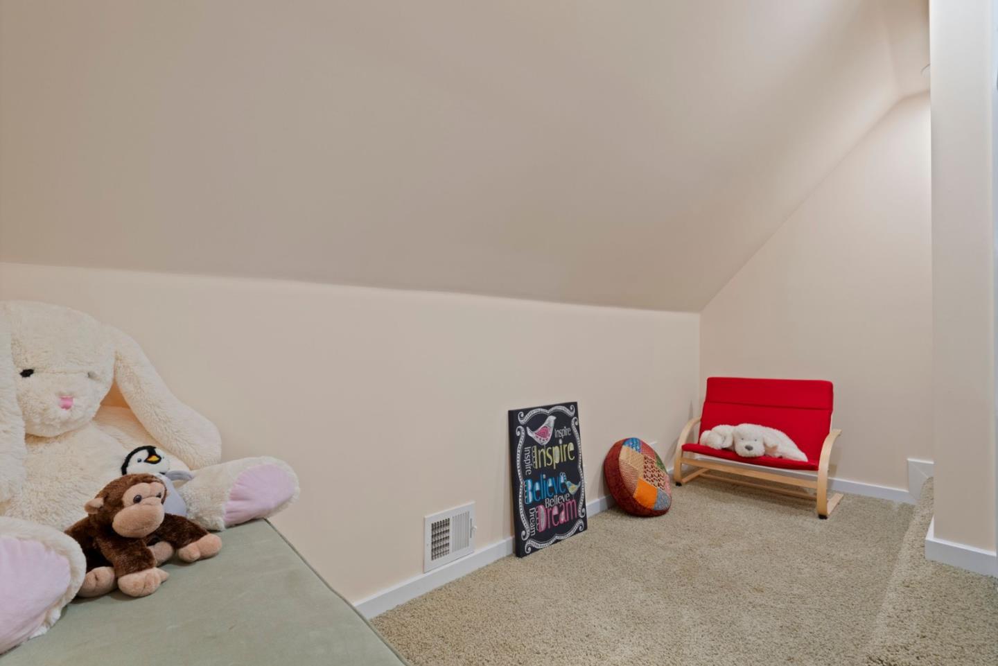 70 Joyce Road Hillsborough, CA 94010 - Photo 40 of 100 a bedroom with a bed and a couch