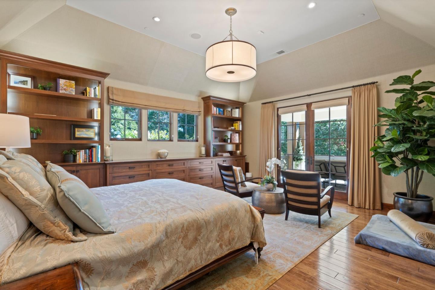 70 Joyce Road Hillsborough, CA 94010 - Photo 53 of 100 a bedroom with a large bed and a chandelier