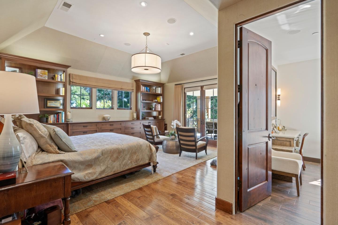 70 Joyce Road Hillsborough, CA 94010 - Photo 58 of 100 a bedroom with a bed and wooden floor