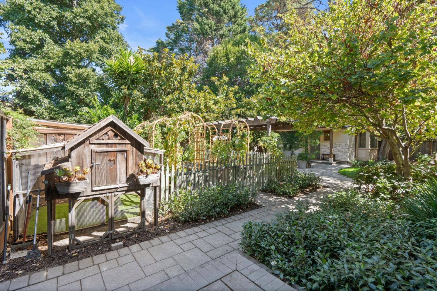 70 Joyce Road Hillsborough, CA 94010 - Photo 72 of 100 a view of a pathway of a house with a small yard