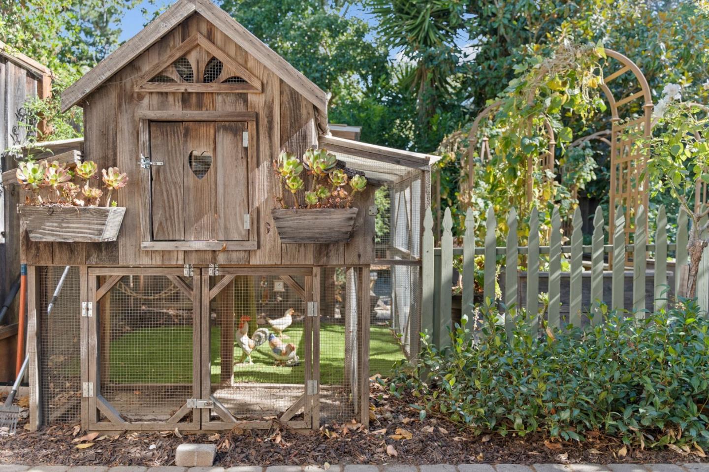 70 Joyce Road Hillsborough, CA 94010 - Photo 73 of 100 a front view of a house with garden