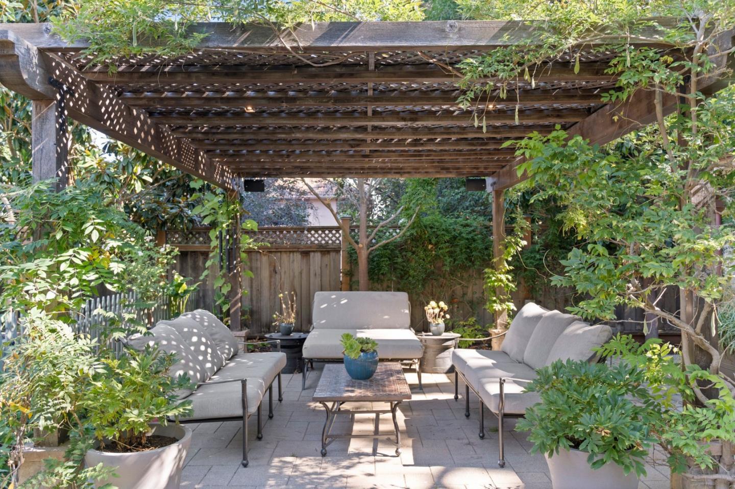 70 Joyce Road Hillsborough, CA 94010 - Photo 75 of 100 a view of backyard with outdoor seating and plants