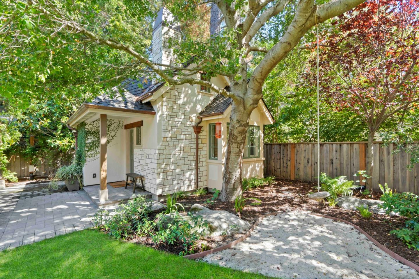 70 Joyce Road Hillsborough, CA 94010 - Photo 83 of 100 a view of a backyard with plants and large tree