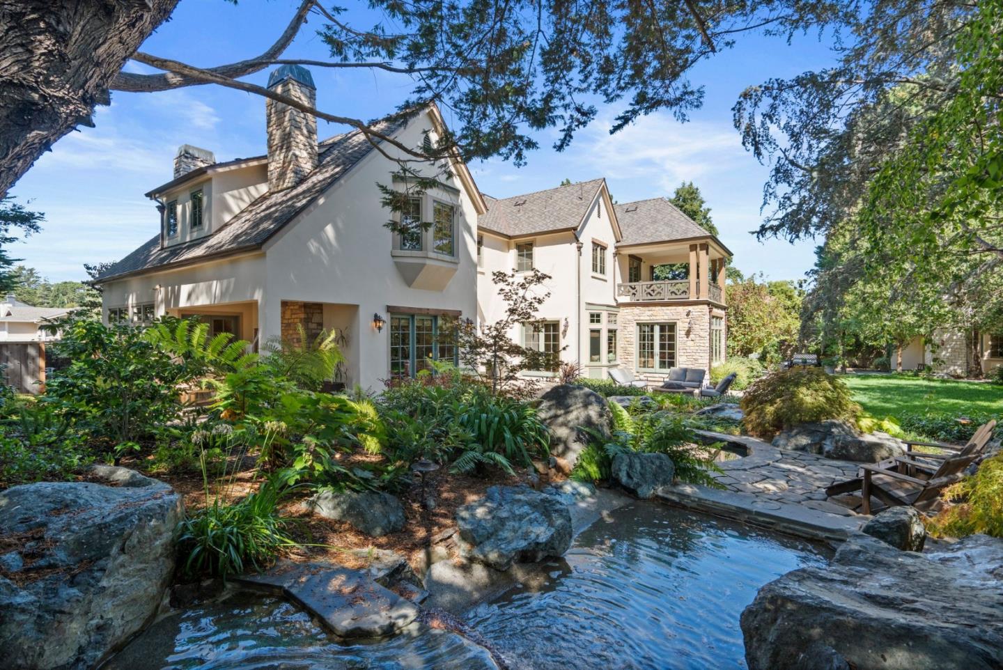 70 Joyce Road Hillsborough, CA 94010 - Photo 90 of 100 a front view of a house with a garden