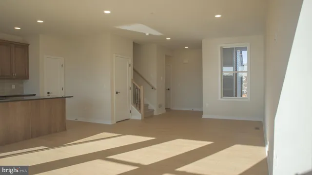 a view of a hallway with entryway