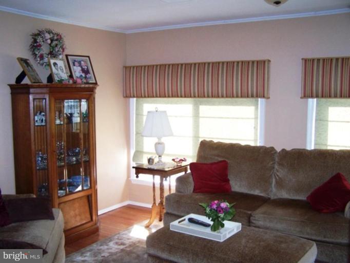 2035 Papas Lane Lusby, MD 20657 - Photo 2 of 12 a living room with furniture and a window