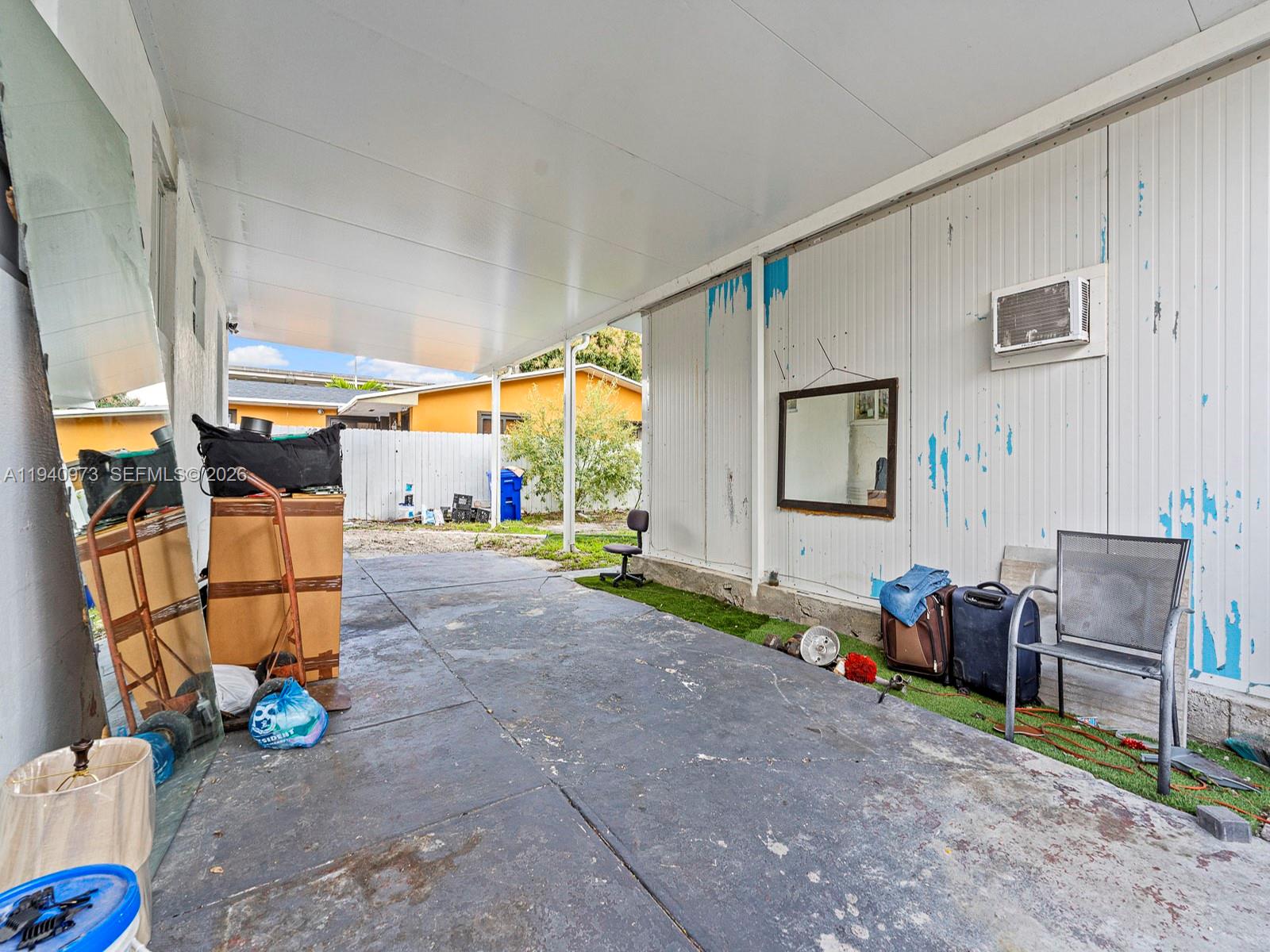 1230 Northwest 35th Street Miami, FL 33142 - Photo 23 of 36 a view of play room with wooden floor