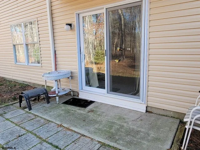 a view of a backyard of the house