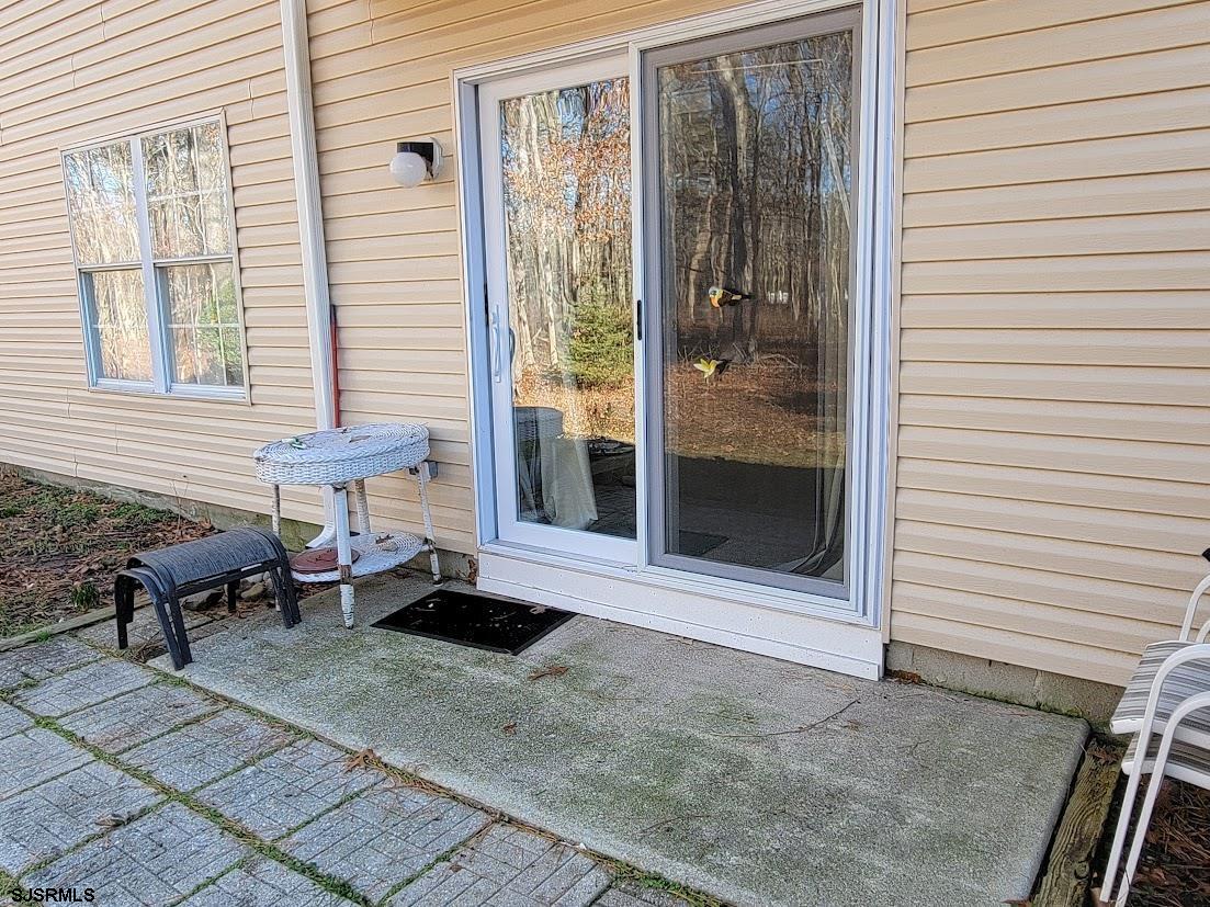 99 Club Place, Unit 99 Galloway Township, NJ 08205 - Photo 11 of 24 a view of a entryway door front of house