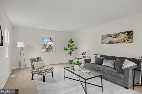 a living room with furniture and a couch