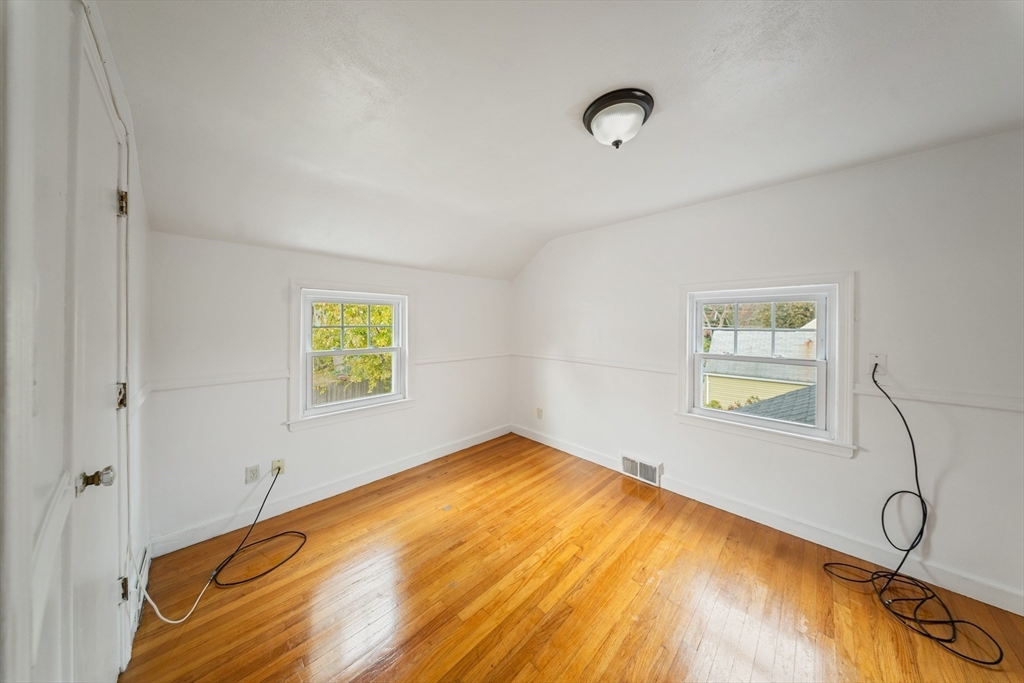 1078 Liberty Street Springfield, MA 01104 - Photo 24 of 42 a view of a room with wooden floor and window