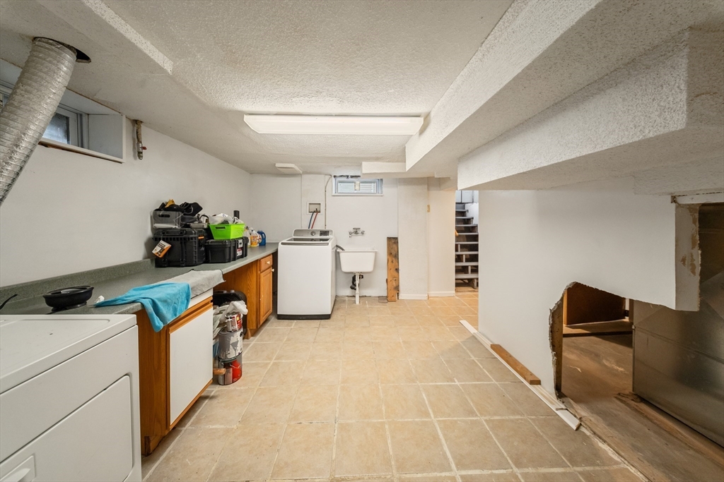 1078 Liberty Street Springfield, MA 01104 - Photo 28 of 42 a room with storage and utility