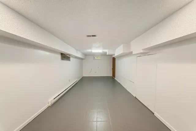 a view of hallway with stairs