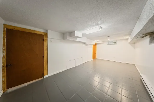 a view of garage and yard