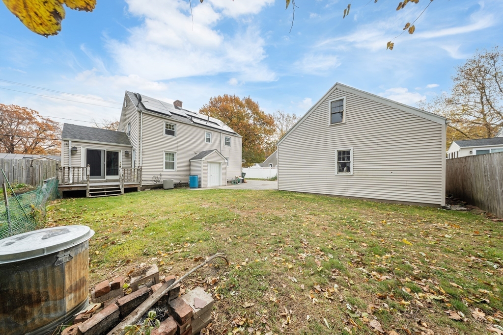 1078 Liberty Street Springfield, MA 01104 - Photo 38 of 42 a view of a backyard with table and chairs