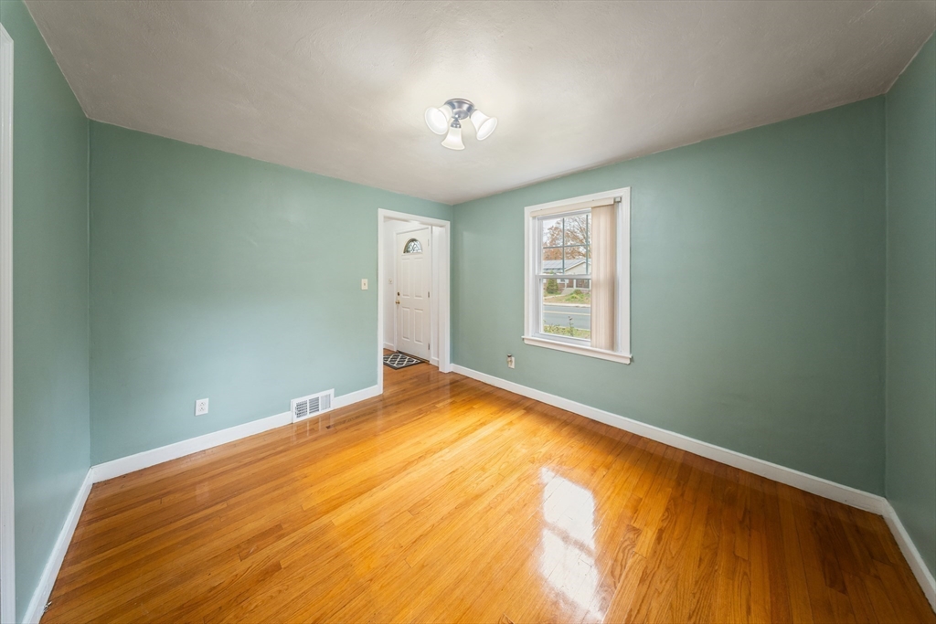 1078 Liberty Street Springfield, MA 01104 - Photo 9 of 42 a view of a big room with windows