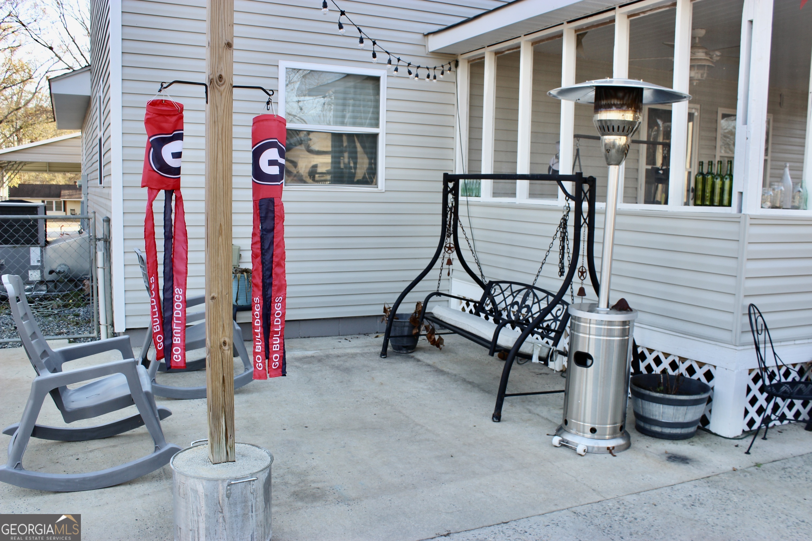 3631 Clay Circle Macon, GA 31216 - Photo 25 of 32 a front view of a house with outdoor seating