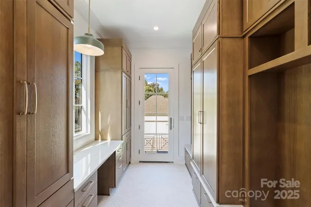 a view of an entryway with chandelier
