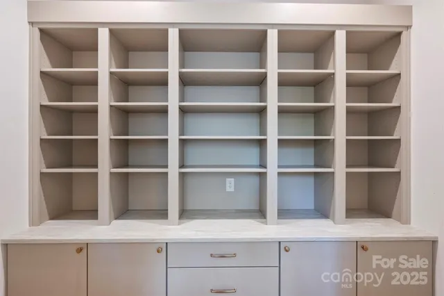 a view of room with empty racks