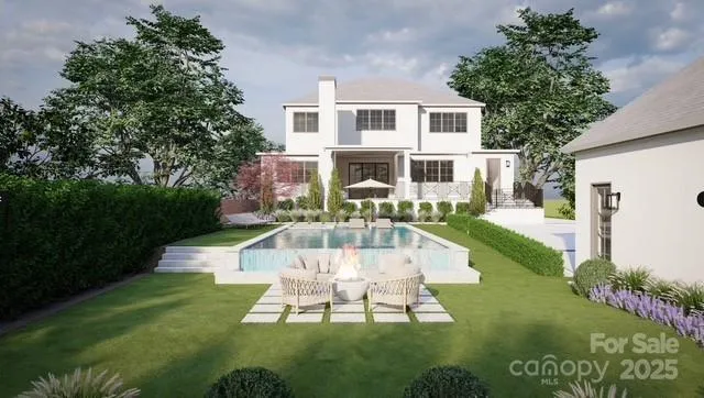 a front view of a house with a yard table and chairs