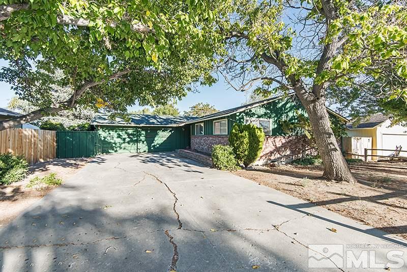1430 Alturas Avenue Reno, NV 89503 - Photo 1 of 15 a backyard of a house with lots of green space