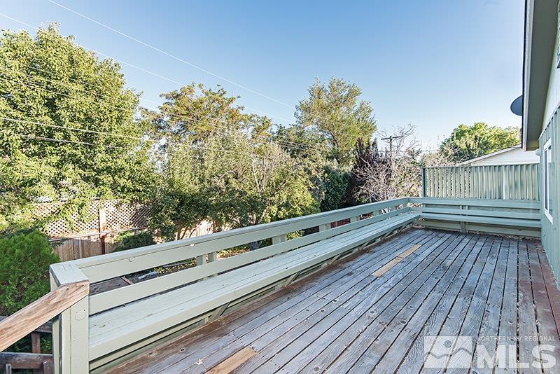 1430 Alturas Avenue Reno, NV 89503 - Photo 13 of 15 a view of balcony with wooden floor and fence