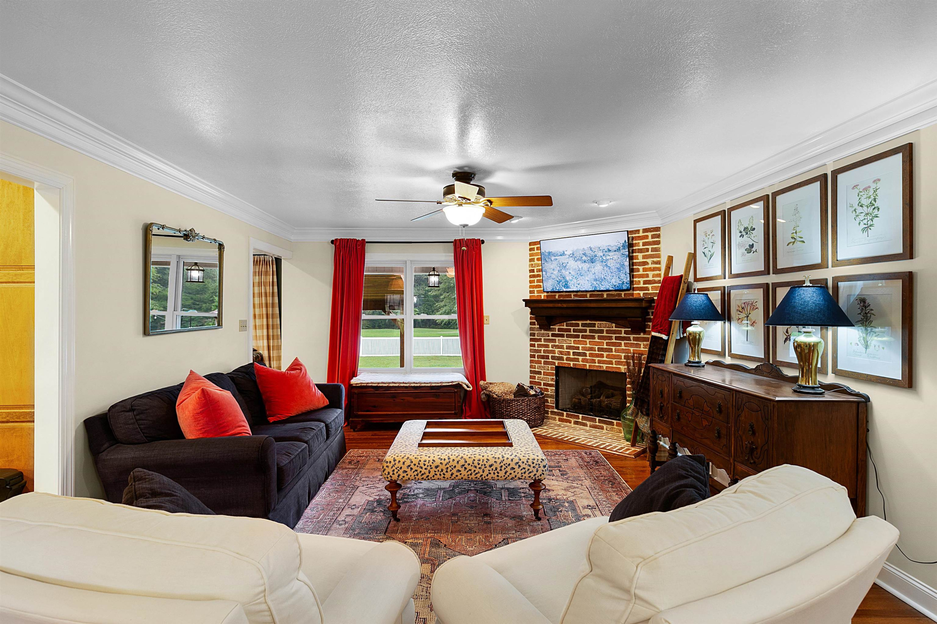 938 Cotton Grove Road Jackson, TN 38305 - Photo 3 of 24 a living room with furniture fireplace and flat screen tv