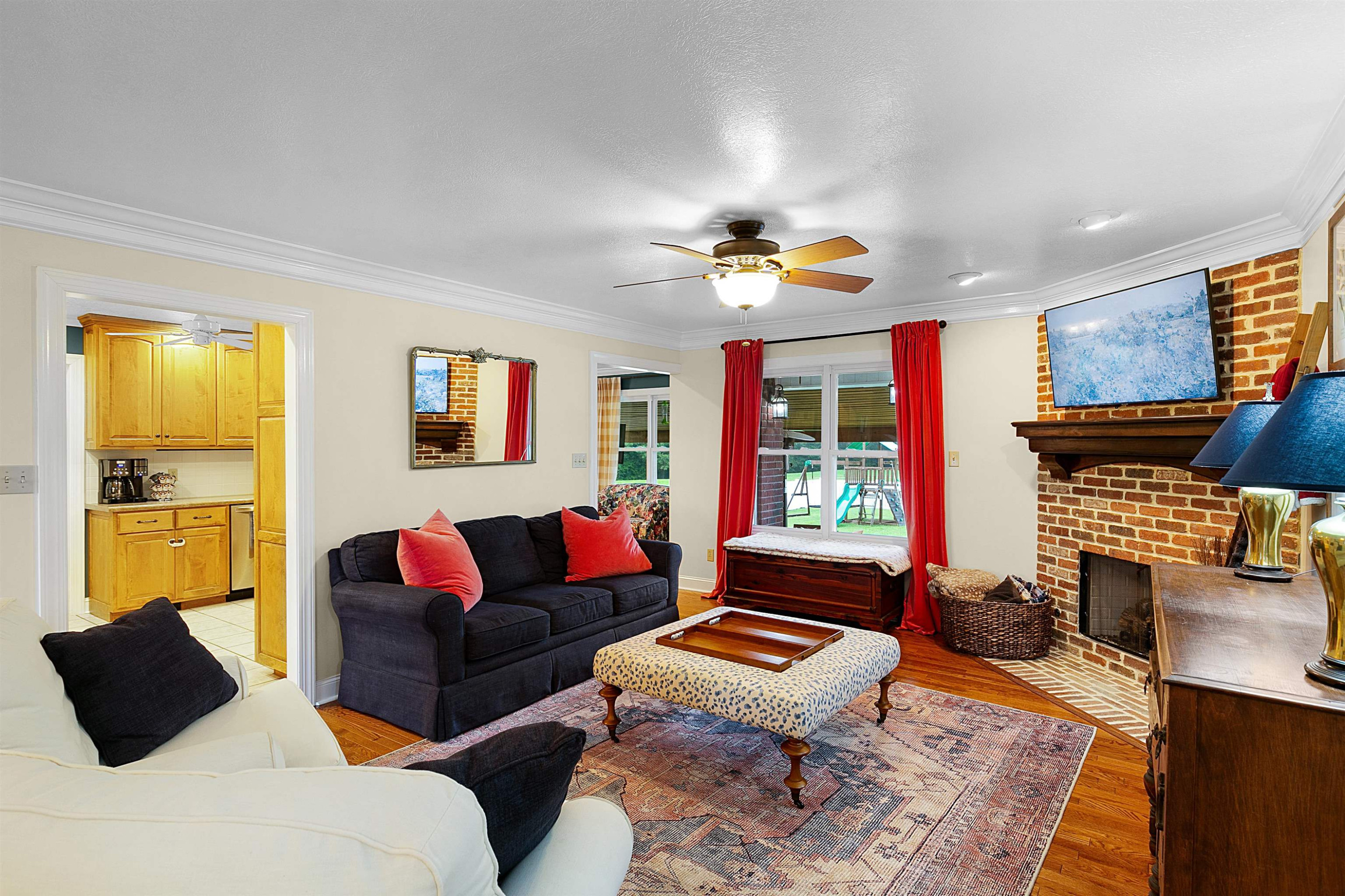 938 Cotton Grove Road Jackson, TN 38305 - Photo 4 of 24 a living room with furniture and wooden floor