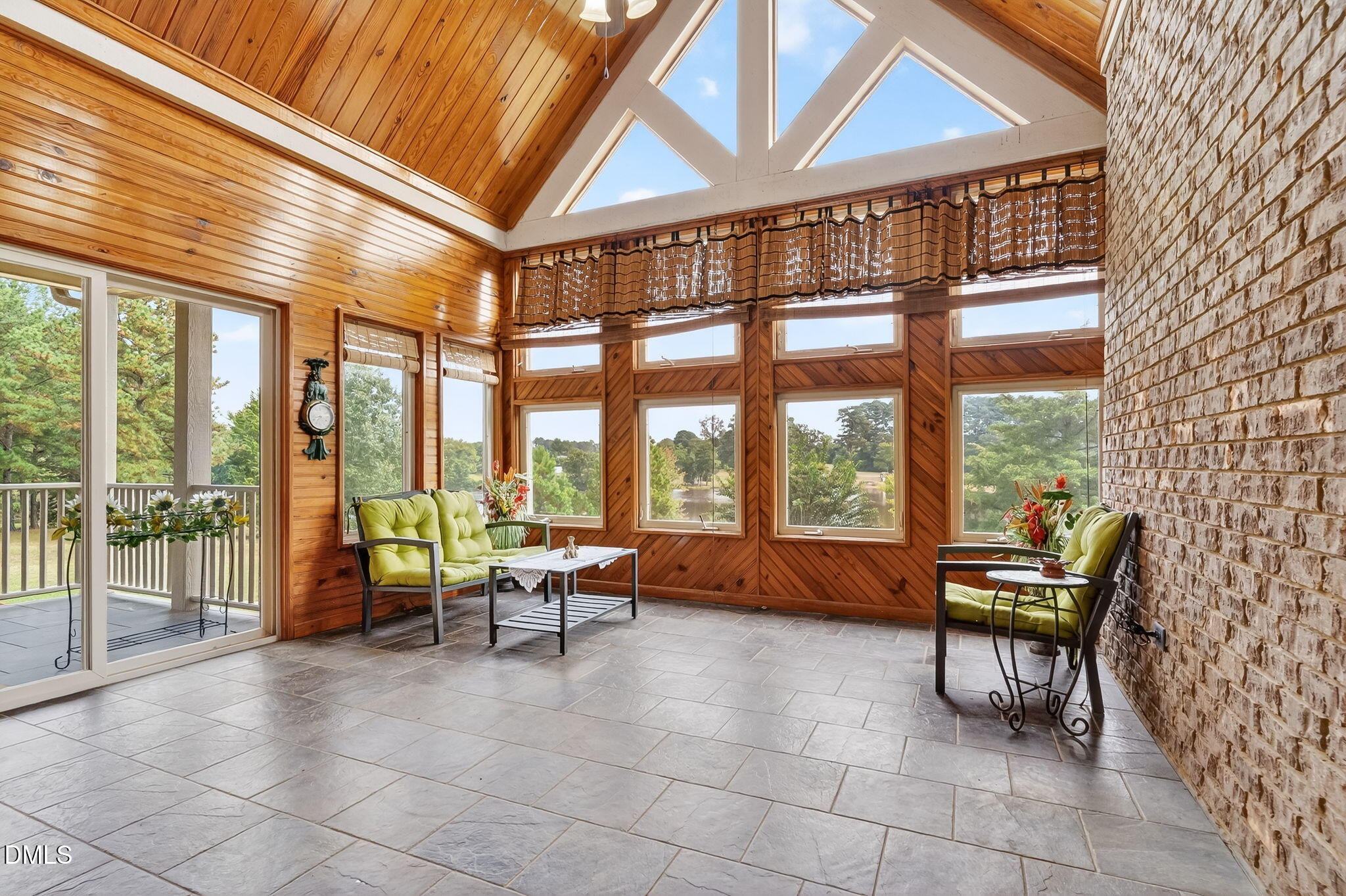 6570 Highway 231 Middlesex, NC 27557 - Photo 35 of 71 a living room with furniture and floor to ceiling windows