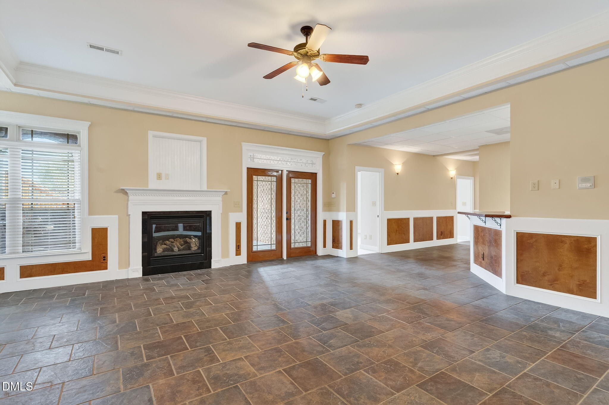 6570 Highway 231 Middlesex, NC 27557 - Photo 45 of 71 a view of an empty room with a fireplace and a window