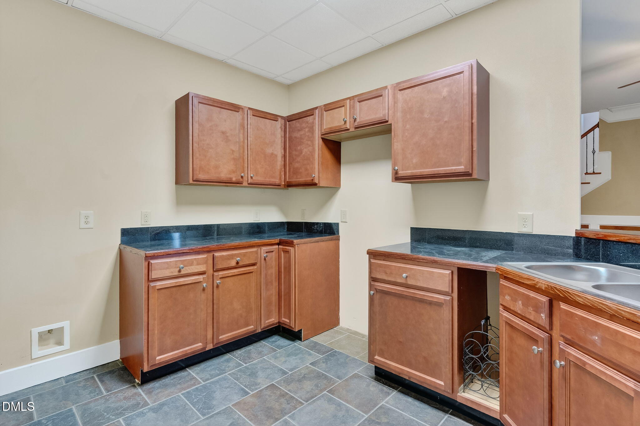 6570 Highway 231 Middlesex, NC 27557 - Photo 51 of 71 a kitchen with granite countertop cabinets stainless steel appliances and a sink