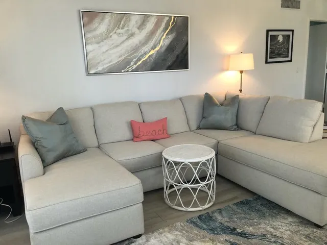 a bedroom with bed and window