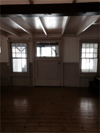 224 Red Gable Road East Brookfield, MA 01515 - Photo 19 of 21 a view of an empty room with wooden floor and a window