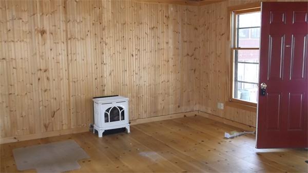 224 Red Gable Road East Brookfield, MA 01515 - Photo 6 of 21 a view of a livingroom with wooden floor and a window